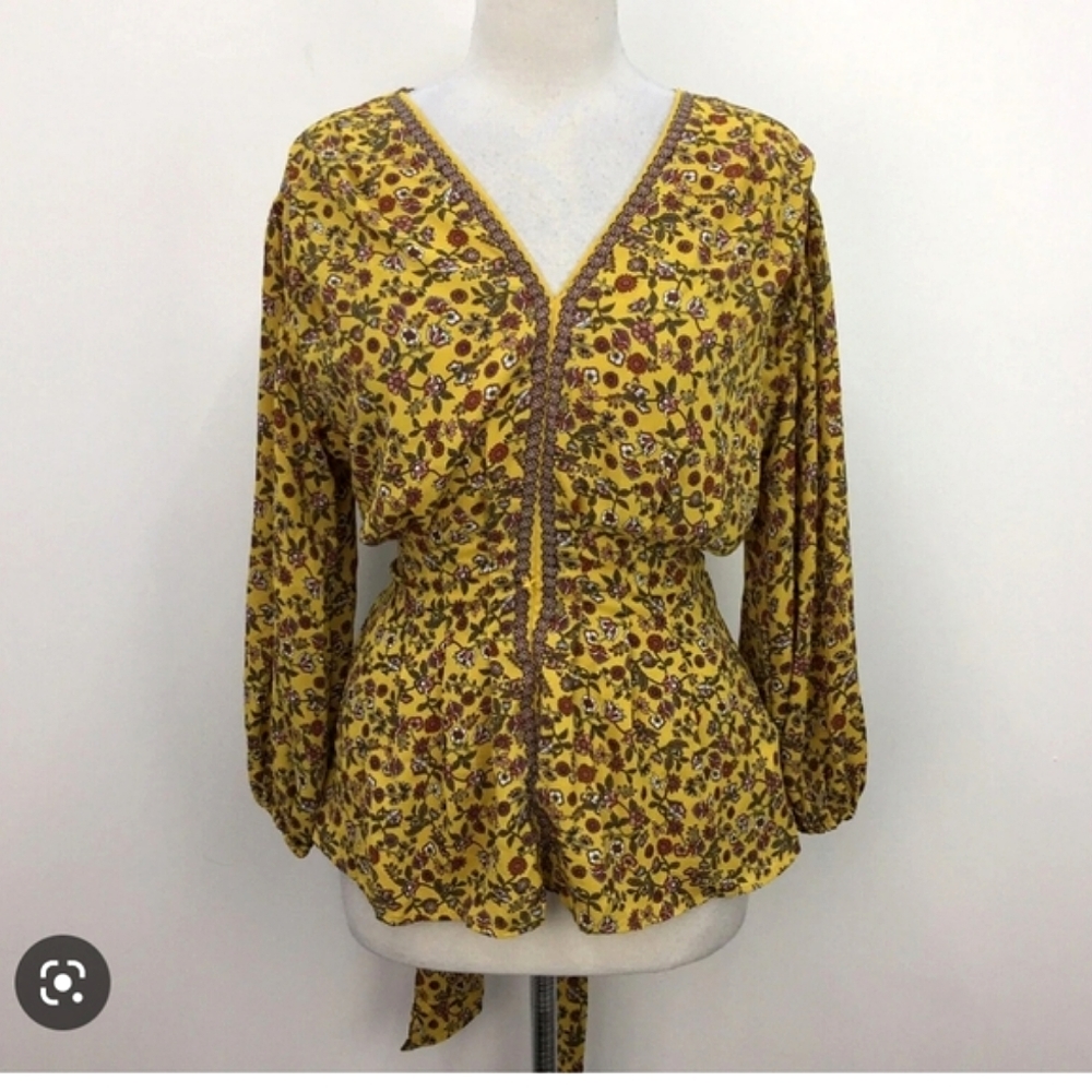 Peplum blouse with front tie
